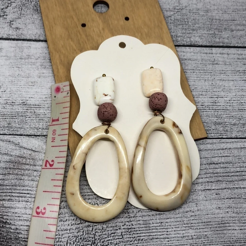 Handcrafted handmade statement style boho earrings long dangle drop.